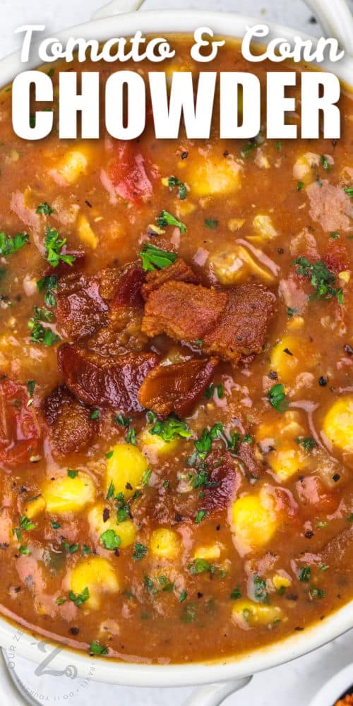 close up of Tomato Corn Chowder with bacon and writing