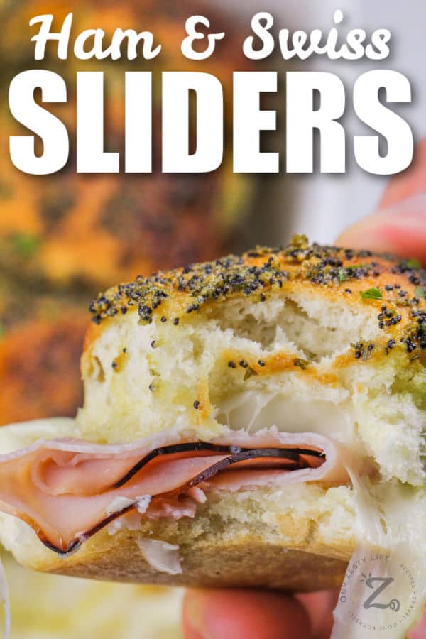 close up of Ham and Swiss Sliders with writing