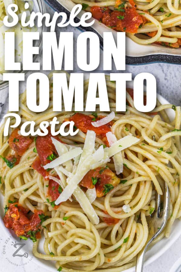 simple lemon tomato pasta in a white bowl with shredded parmesan and parsley as garnish on top, with a title