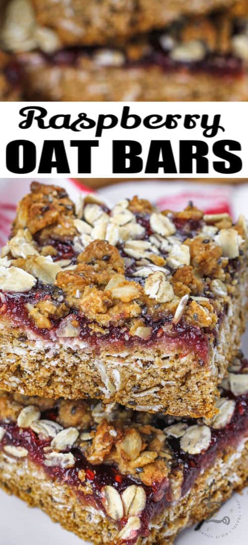 pile of Raspberry Oat Bars with writing
