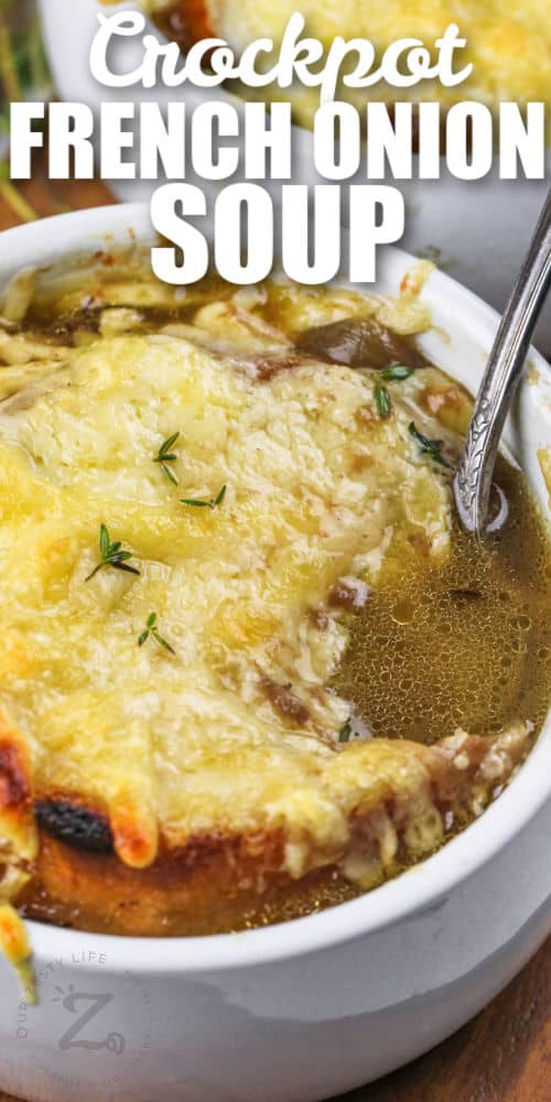 taking a spoonfull of Crockpot French Onion Soup with a title