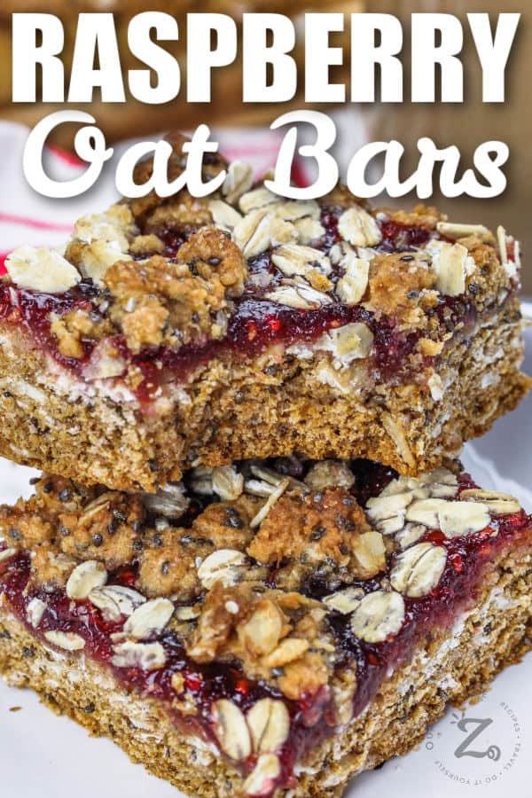 close up of Raspberry Oat Bars with a title
