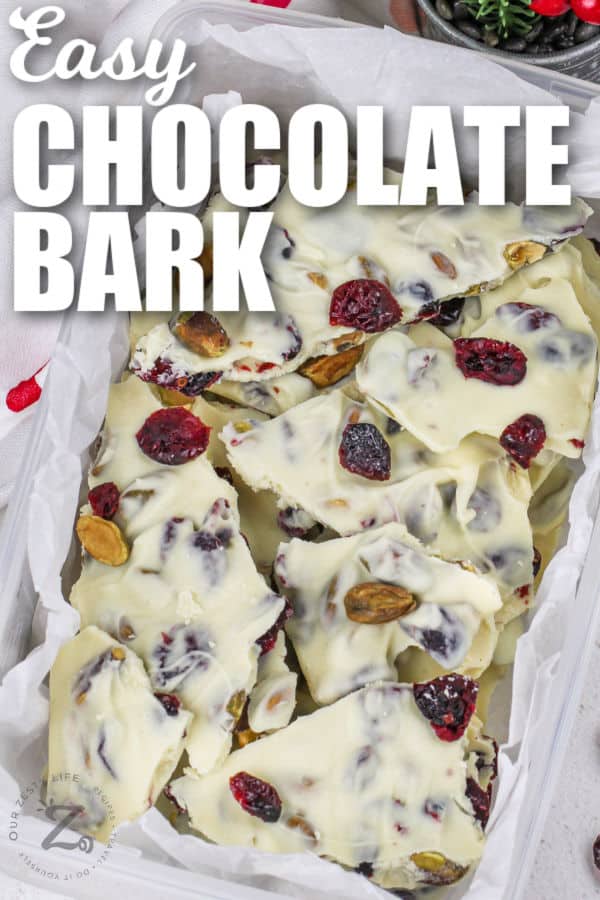 White Chocolate Bark in a container with writing