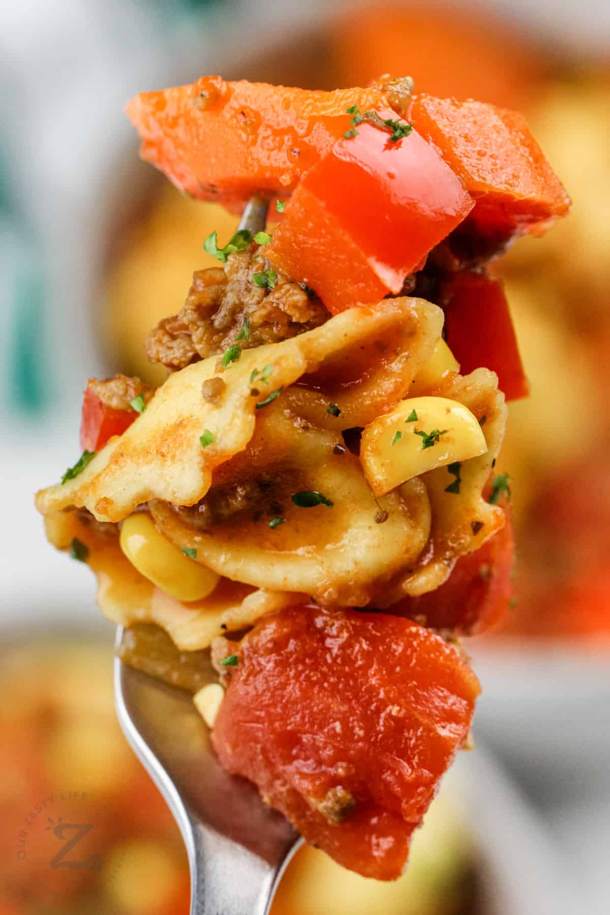 close up of One Pot Tortellini Pasta on a fork