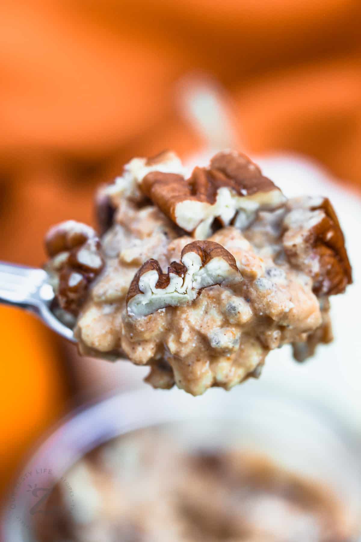 close up of Pumpkin Overnight Oats in a spoon
