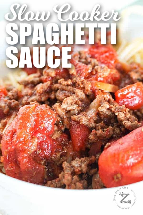 slow cooker spaghetti sauce in a white bowl, with writing
