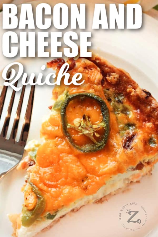 zesty bacon and cheese quiche on a white plate with a fork and quiche in a pie plate on the side, with a title