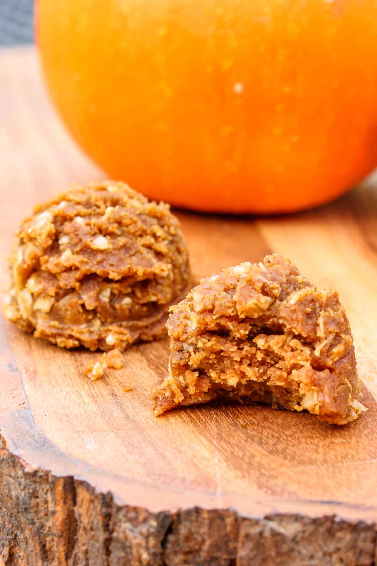 Pumpkin Energy Balls Recipe with a bite taken out of one