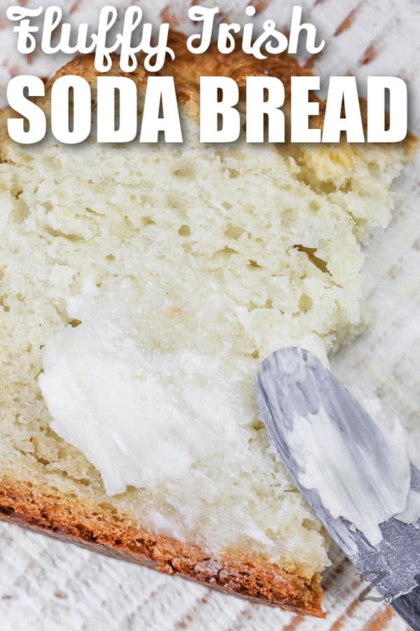spreading butter on Irish Soda Bread slice with writing