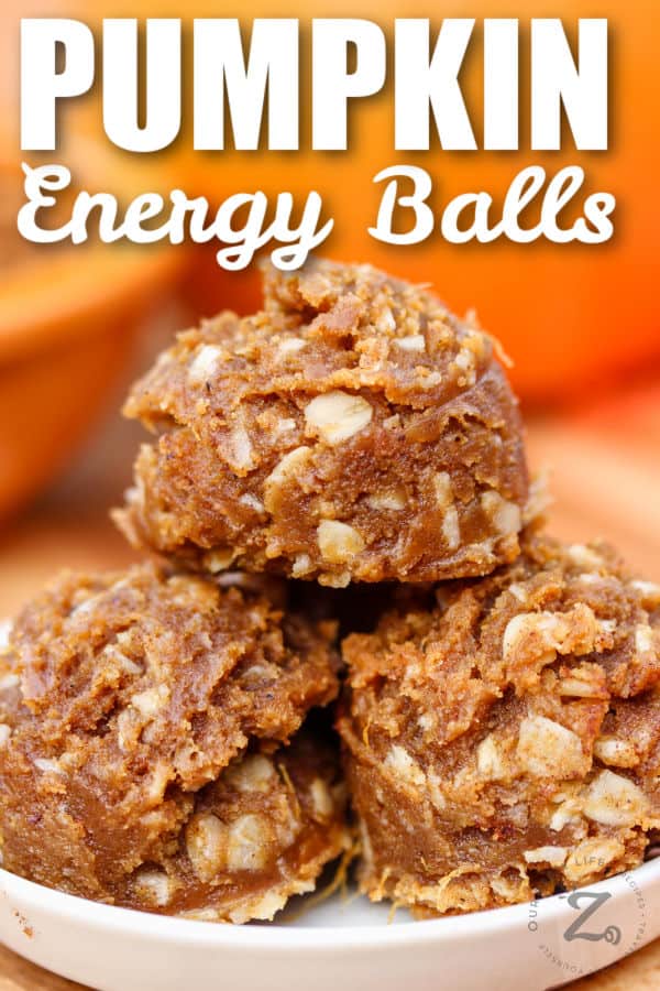 close up of Pumpkin Energy Balls Recipe on a plate with writing