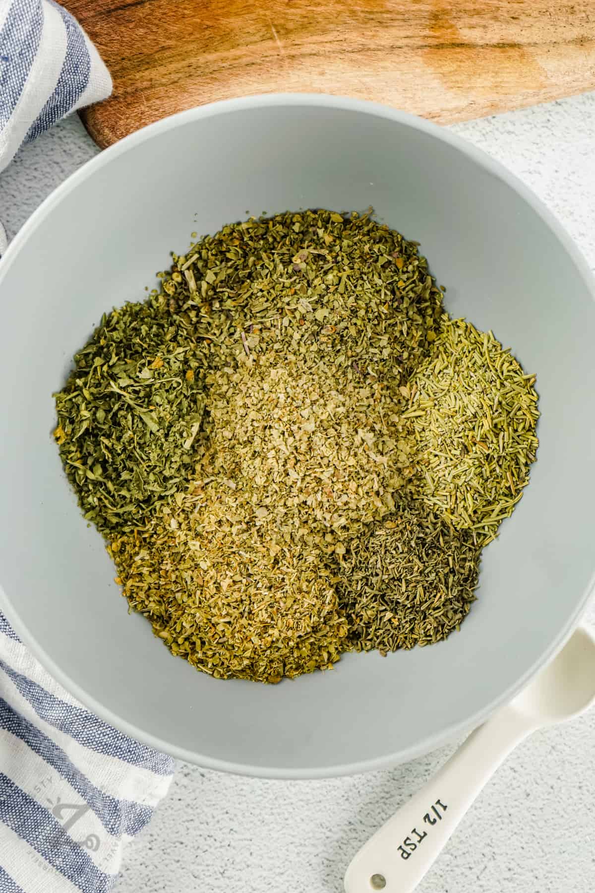 spices in a bowl together to make Homemade Italian Seasoning