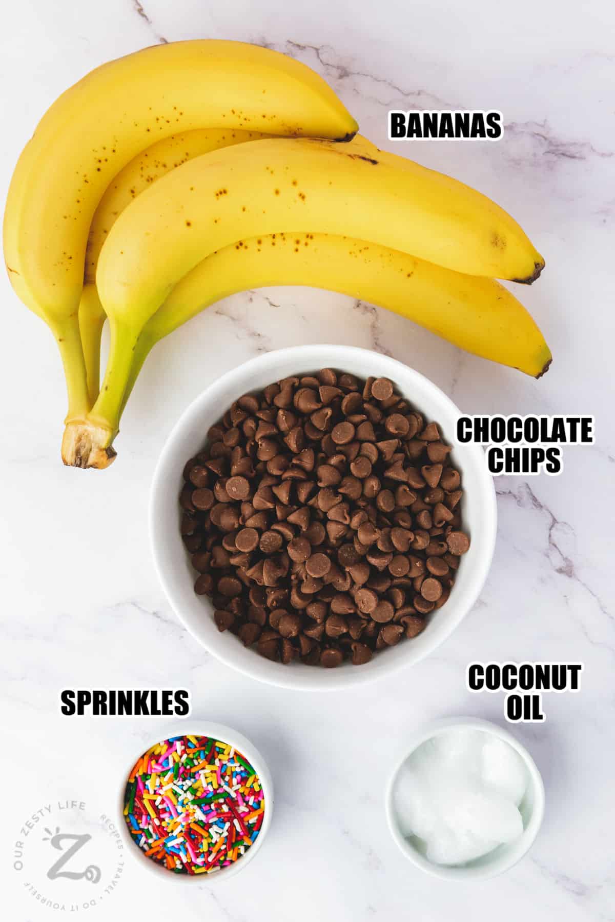bananas , chocolate chips , coconut oil and sprinkles with labels to make Chocolate Dipped Bananas