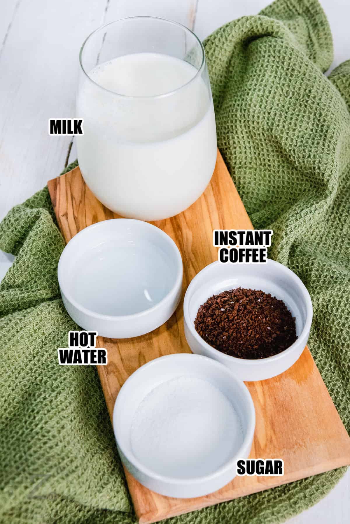 milk , instant coffee , hot water and sugar to make Dalgona Coffee with labels