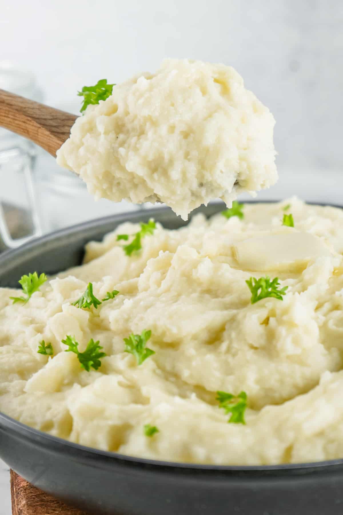 Instant Pot Mashed Potatoes on a wooden spoon