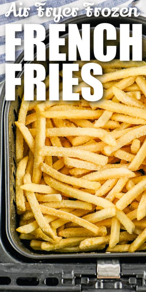 Air Fryer Frozen French Fries int he fryer before cooking with writing