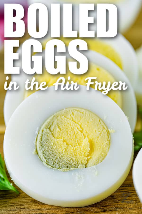 close up of Air Fryer Boiled Eggs slices with writing