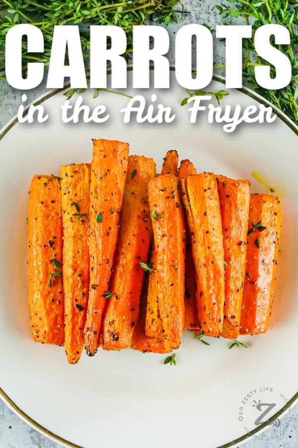 seasoned Air Fryer Carrots on a plate with a title