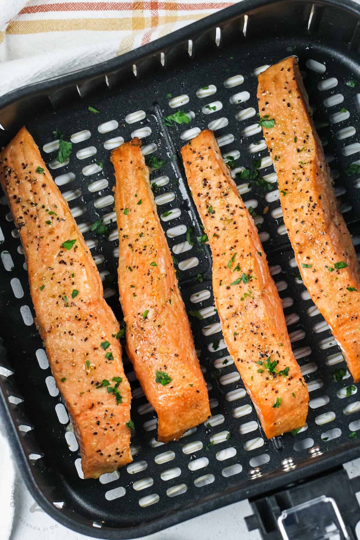 cooked Air Fryer Salmon in the fryer