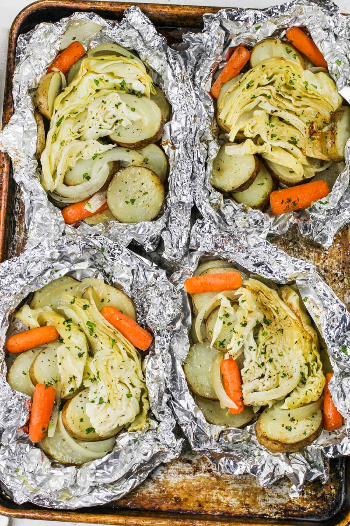 Cabbage and Potato Foil Packs on a sheet pan