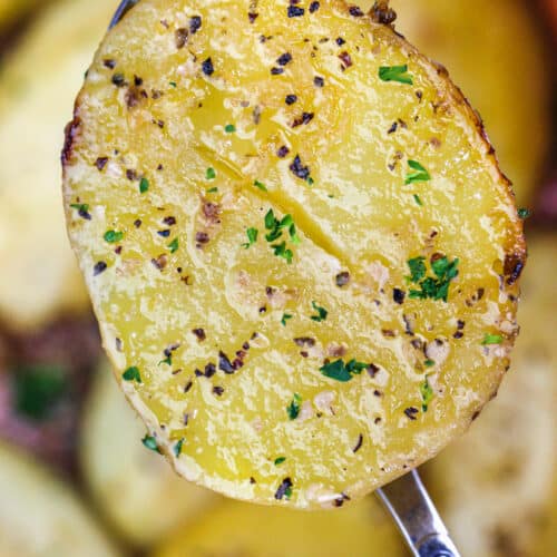 close up of Greek Style Lemon Potatoes on a spoon