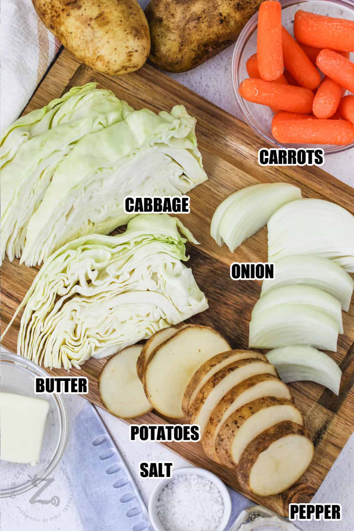 cabbage , carrots , onion , butter , potatoes , salt and pepper with labels to make Cabbage and Potato Foil Packs