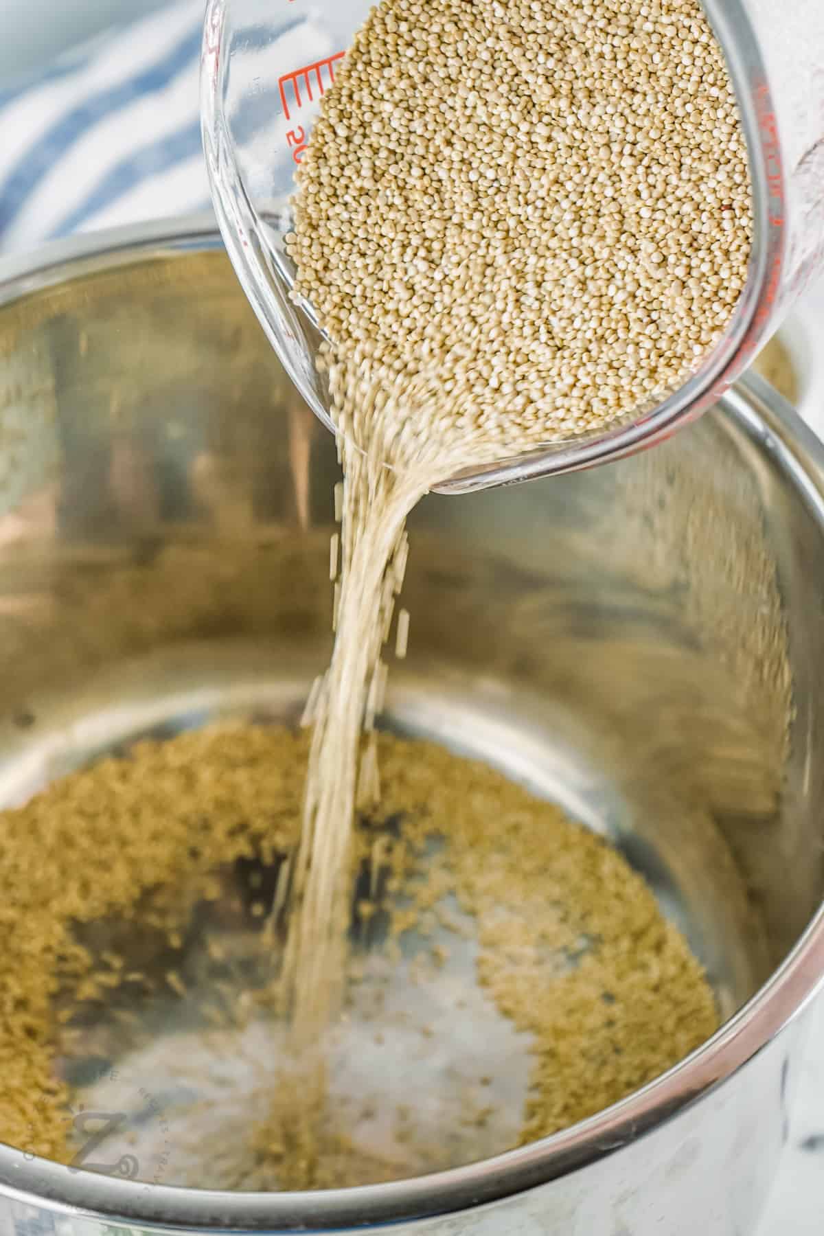 pouring quinoa into pot to make Instant Pot Quinoa