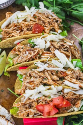 adding cheese to Instant Pot Shredded Chicken Tacos
