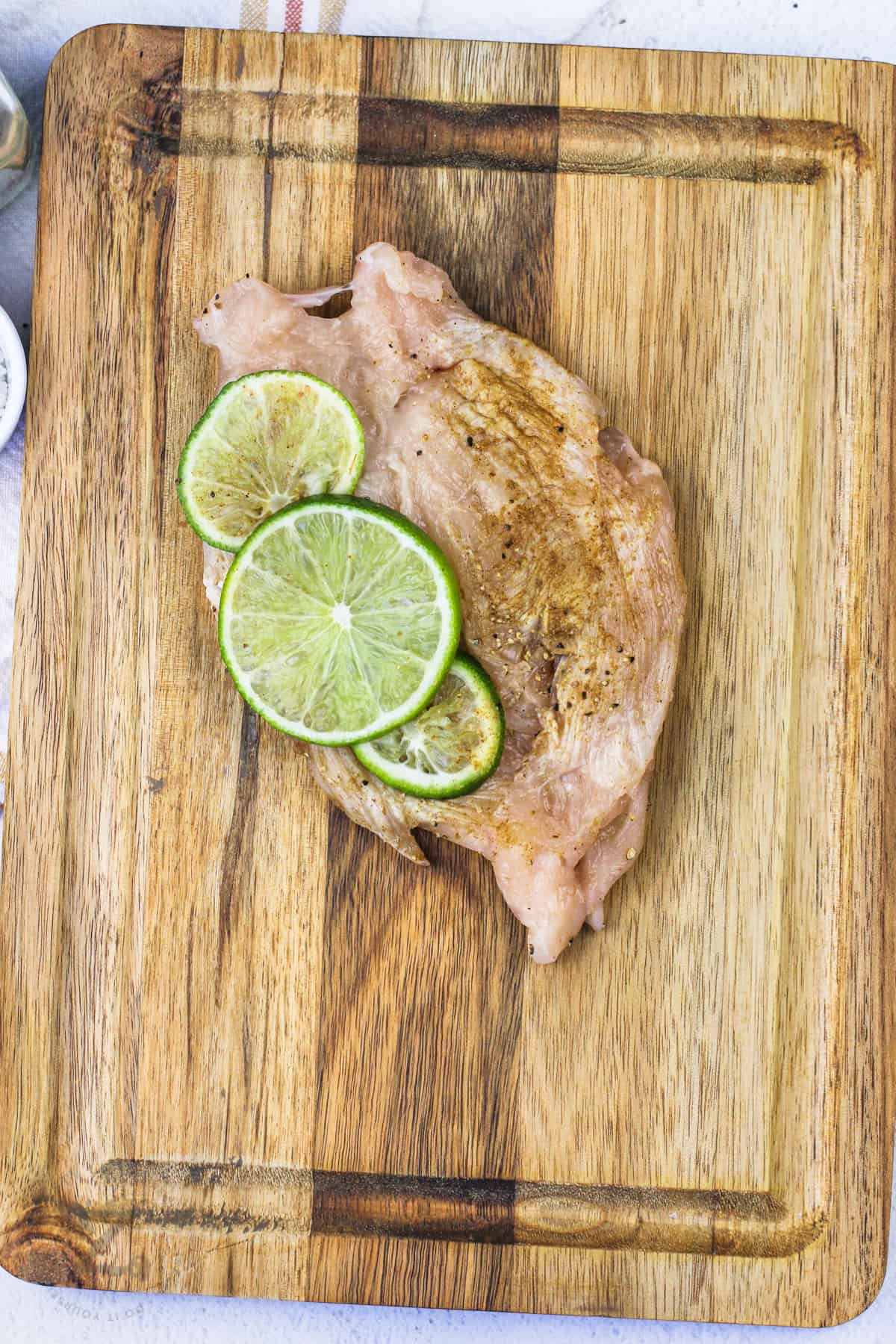 adding lime to chicken to make Lime Chicken