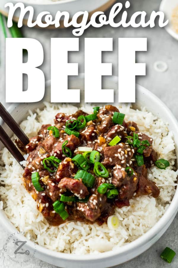 Slow Cooker Mongolian Beef on rice with a title