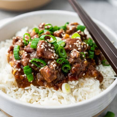 plated Slow Cooker Mongolian Beef with chop sticks
