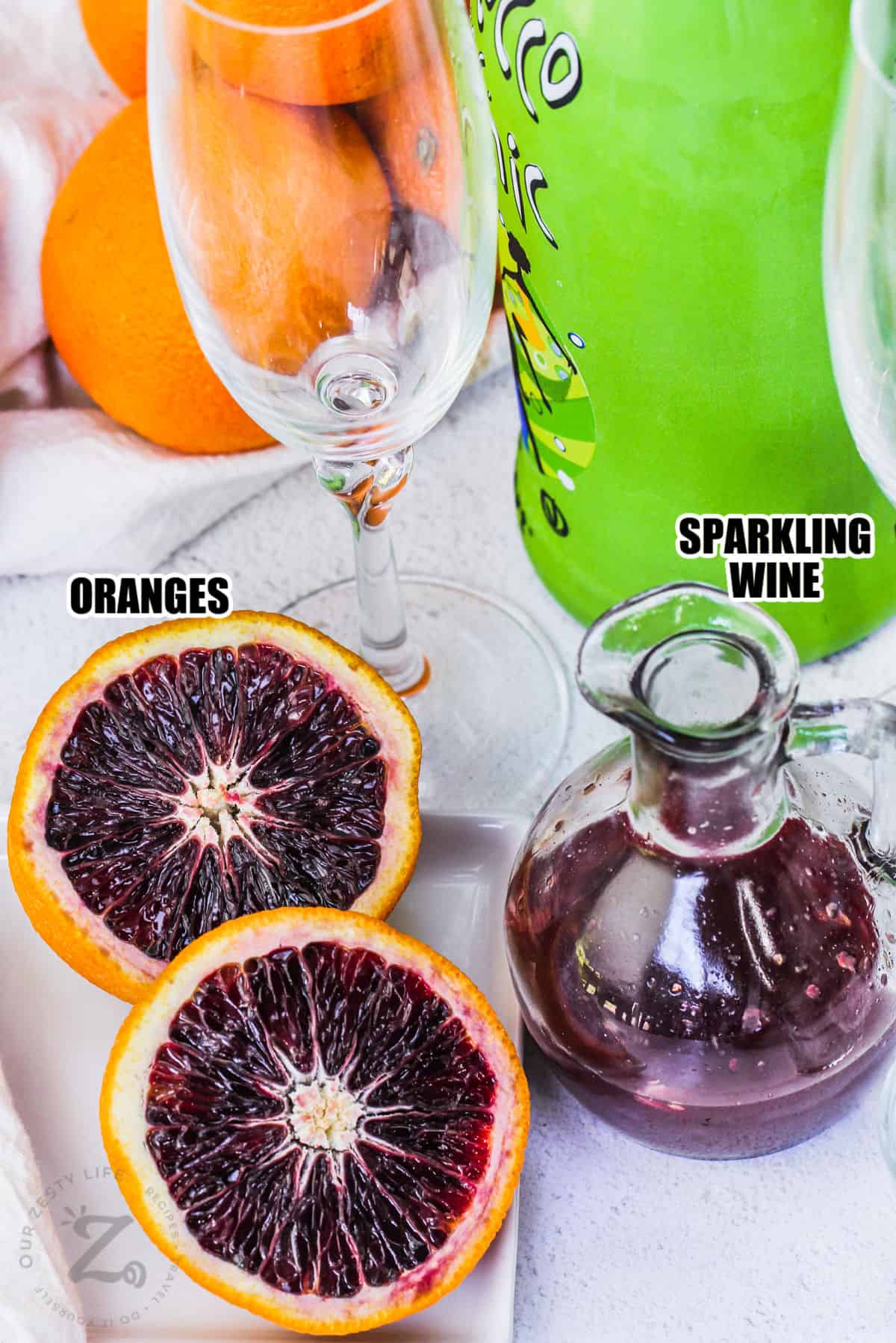 oranges and sparkling wine to make Blood Orange Mimosa