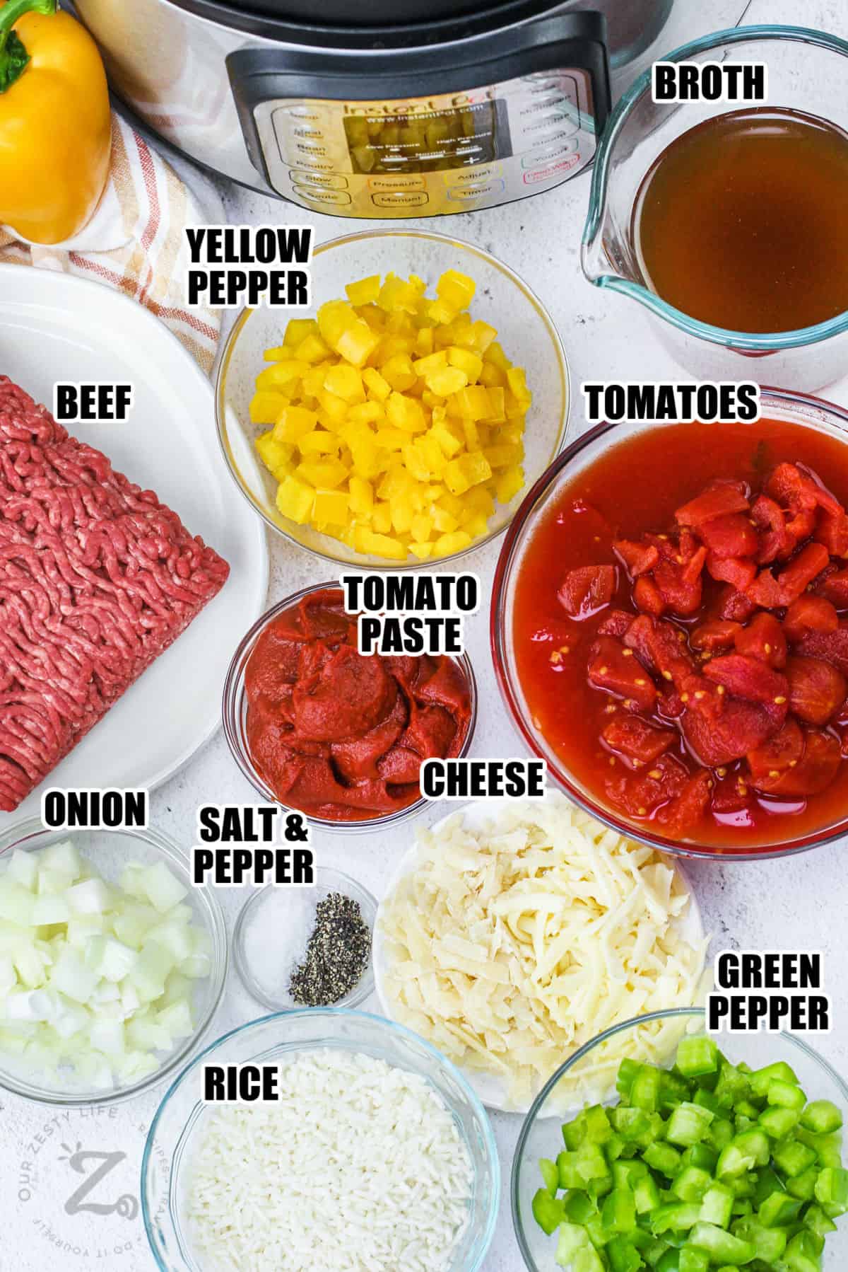 broth , yellow pepper , tomatoes , beef , tomato paste , cheese , onion , rice , greep pepper , salt and pepper with labels to make Instant Pot Unstuffed Peppers
