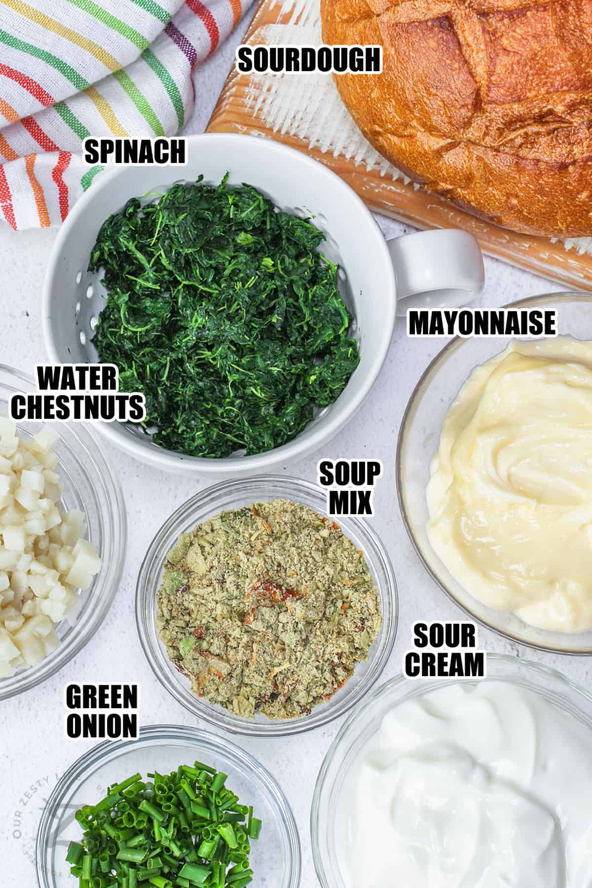 sourdough , spinach , mayonnaise , water chestnuts , soup mix , sour cream , green onion with labels to make Spinach Dip