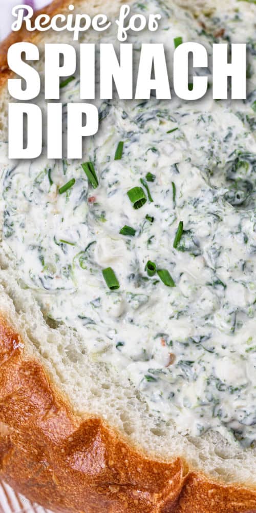 close up of Spinach Dip in a bread bowl and a title
