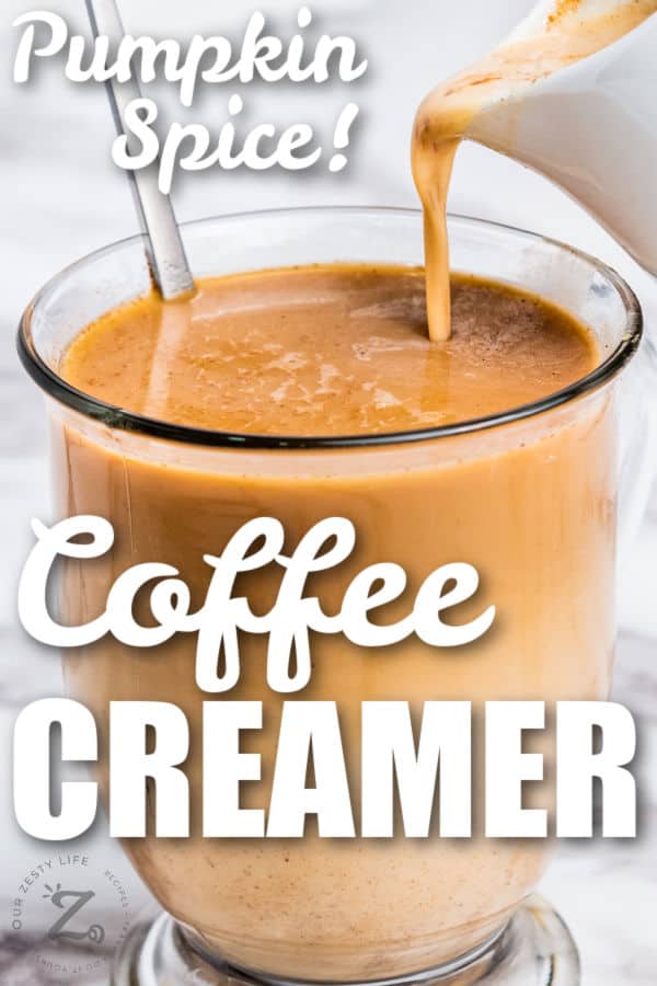 adding Pumpkin Spice Creamer to coffee with writing