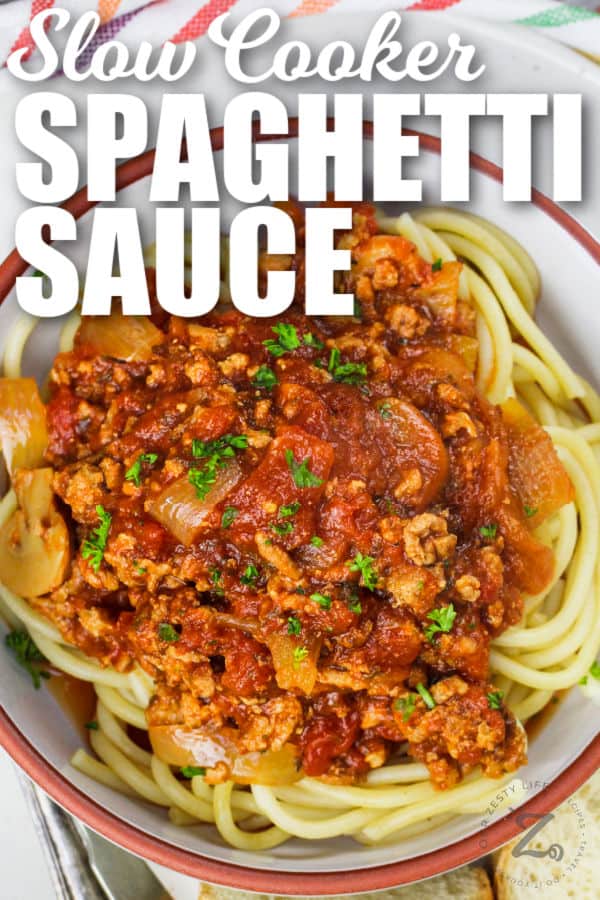 Slow Cooker Spaghetti Sauce on spaghetti with writing
