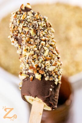 Frozen Chocolate Covered Bananas with chopped nuts