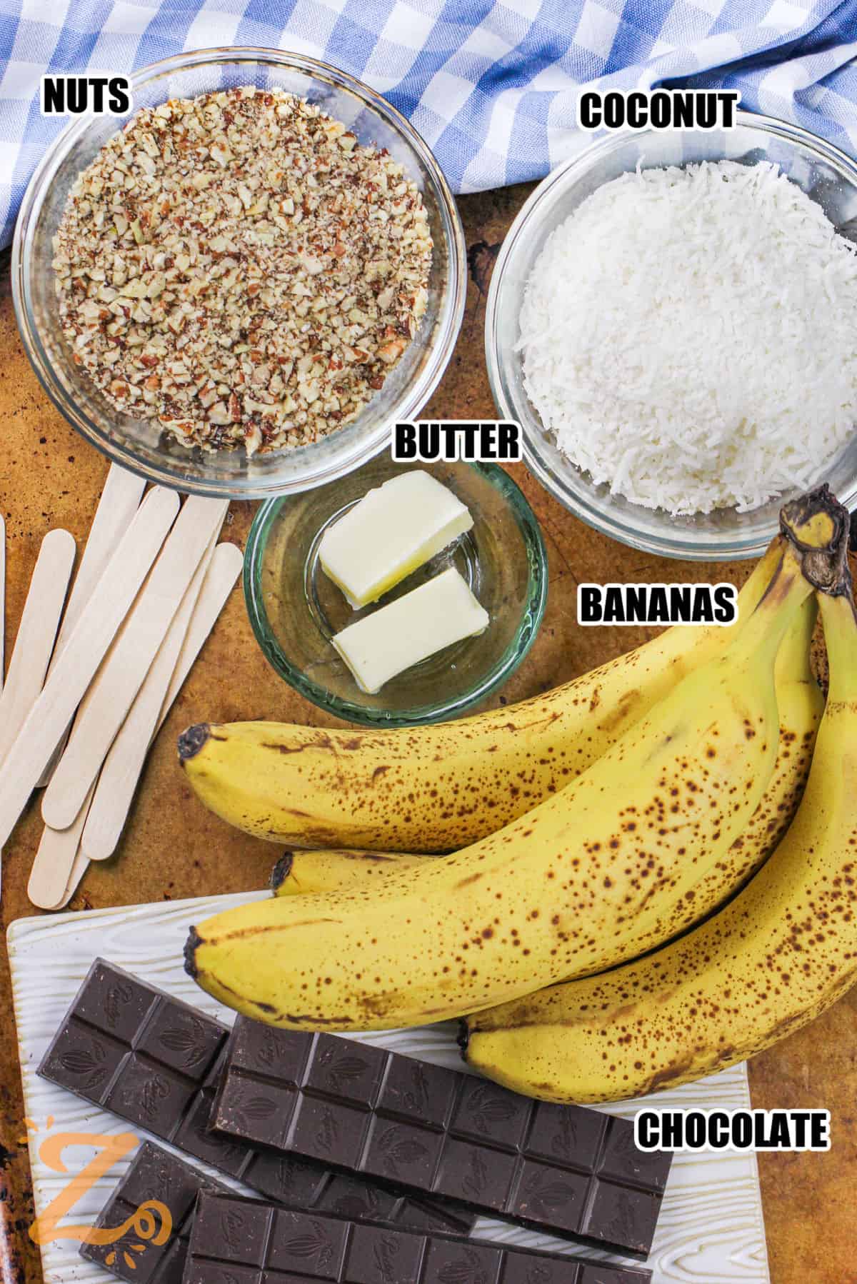 nuts , coconut , butter , bananas and chocolate with labels to make Frozen Chocolate Covered Bananas