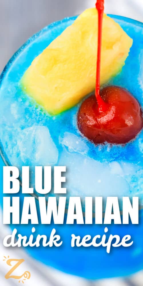 Blue Hawaiian Cocktail with a pineapple wedge and a title