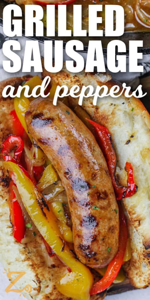 Grilled Sausage and Peppers and onions on a hot dog bun with a title