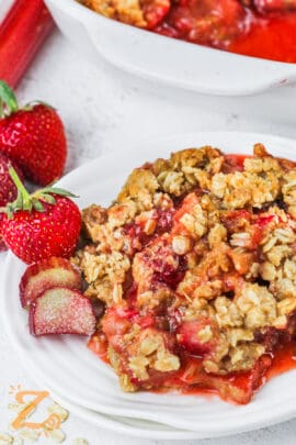 plated Strawberry Rhubarb Crisp with strawberries