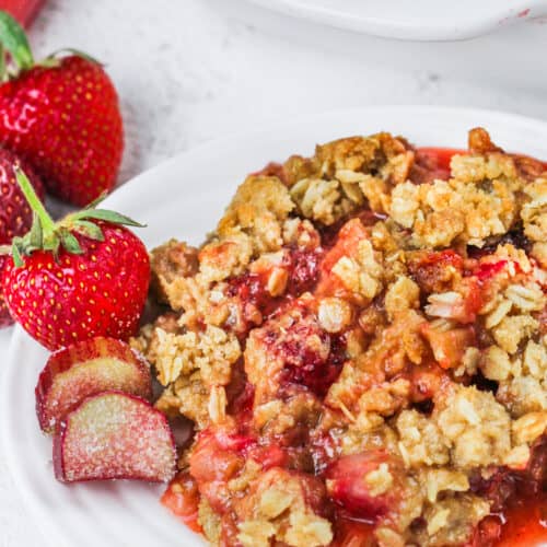 plated Strawberry Rhubarb Crisp with strawberries