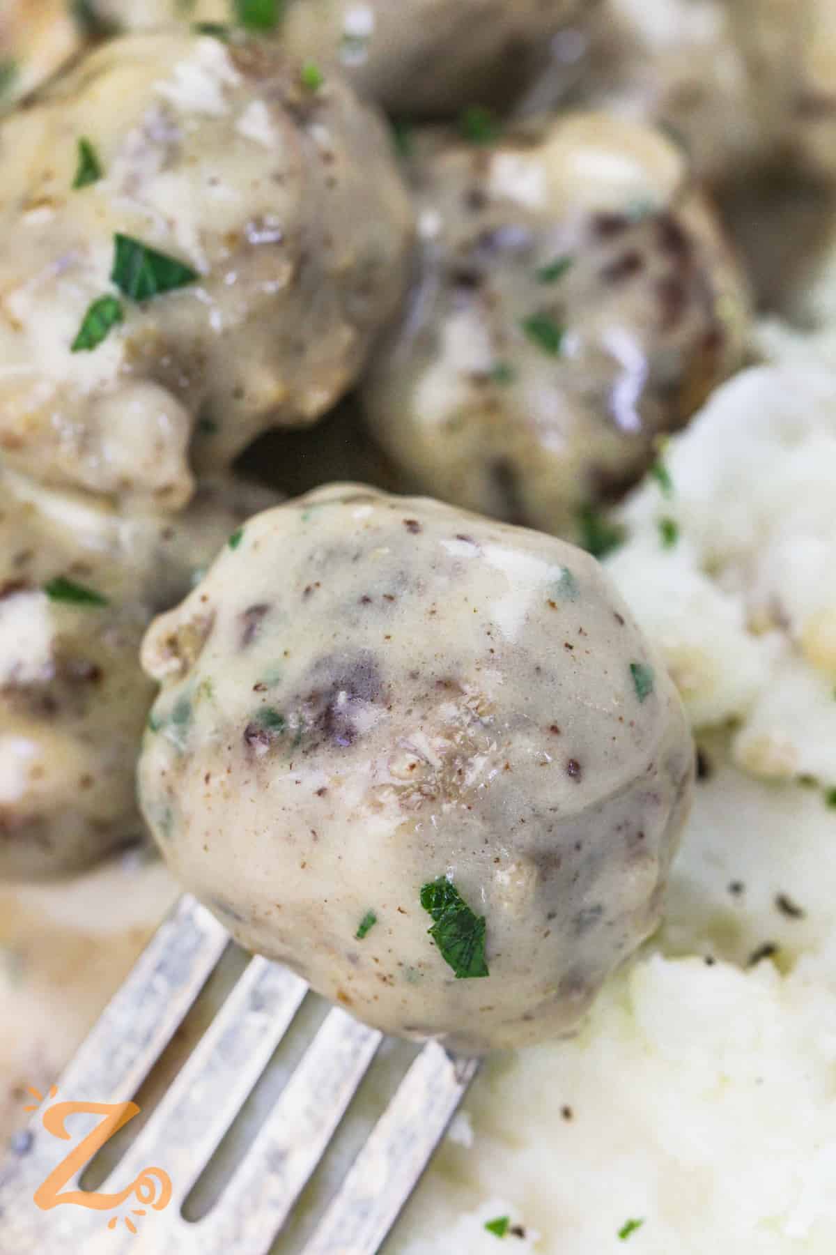 close up of Swedish Meatballs on a fork