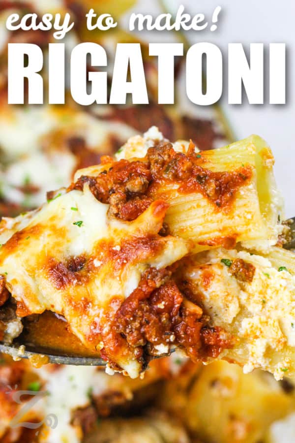 spoon full of Baked Rigatoni with a title