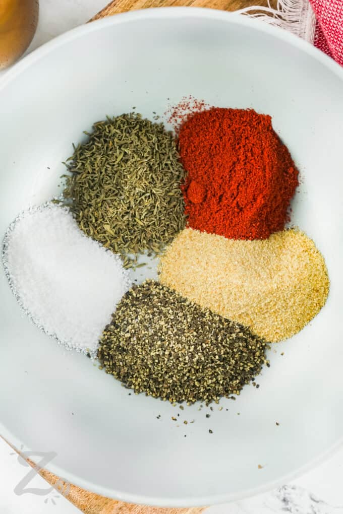 Steak Seasoning spices in a bowl before mixing together