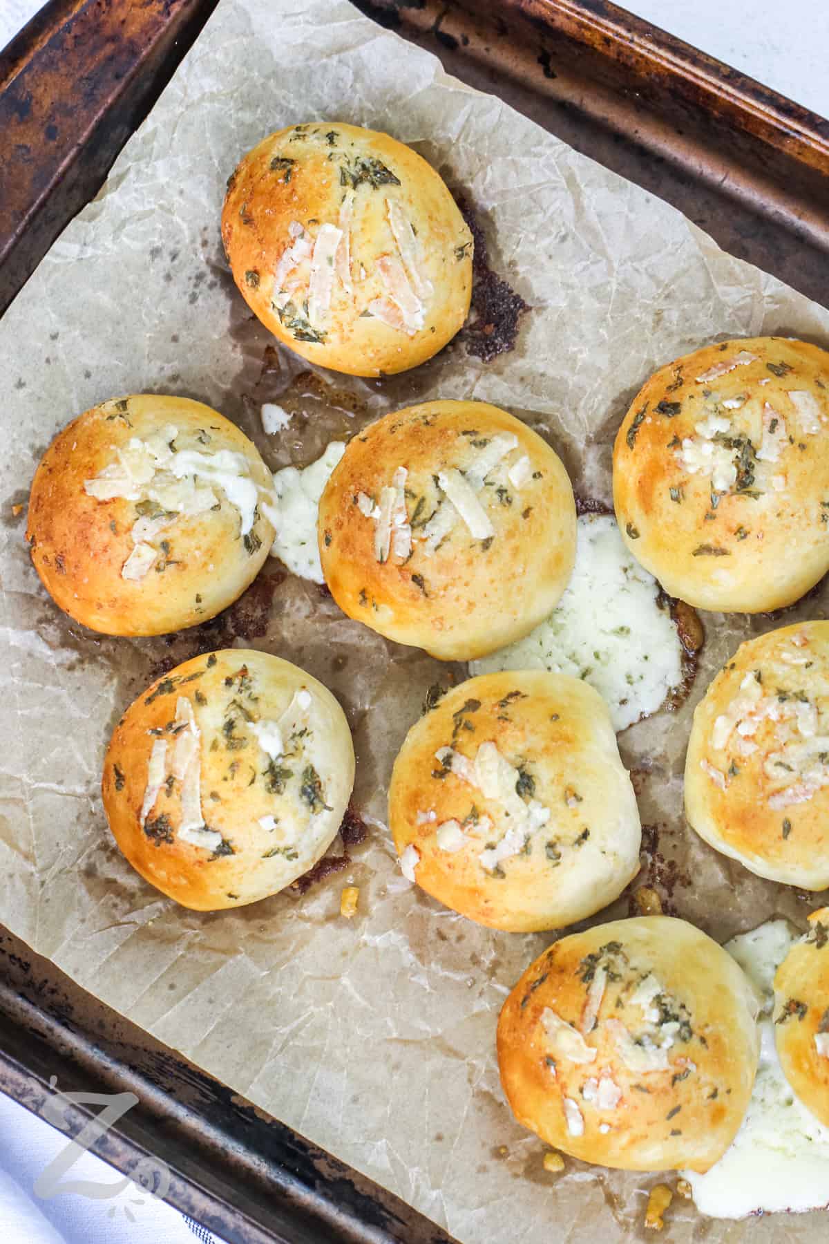 Baked garlic cheese bombs on a pan