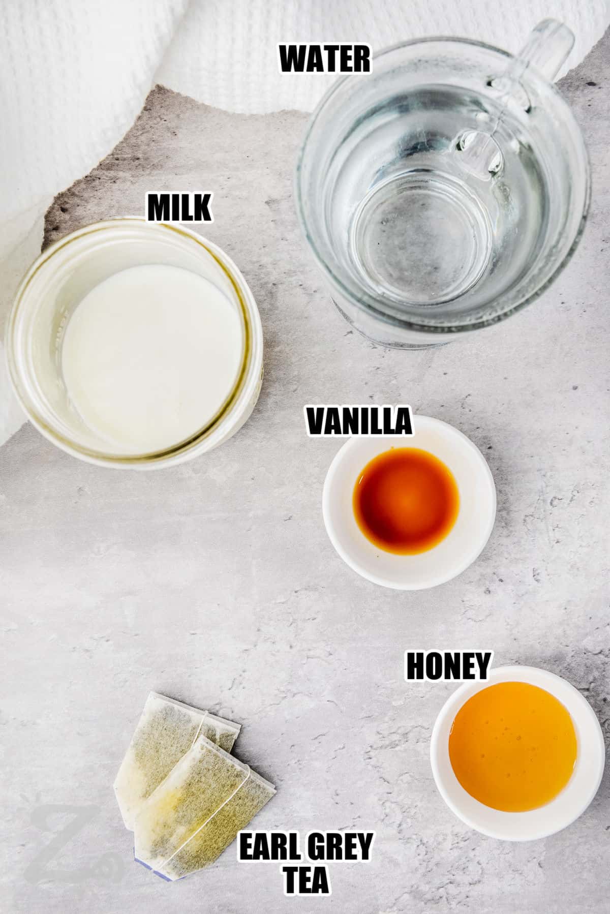 water , milk , vanilla , honey , earl grey tea with labels to make London Fog