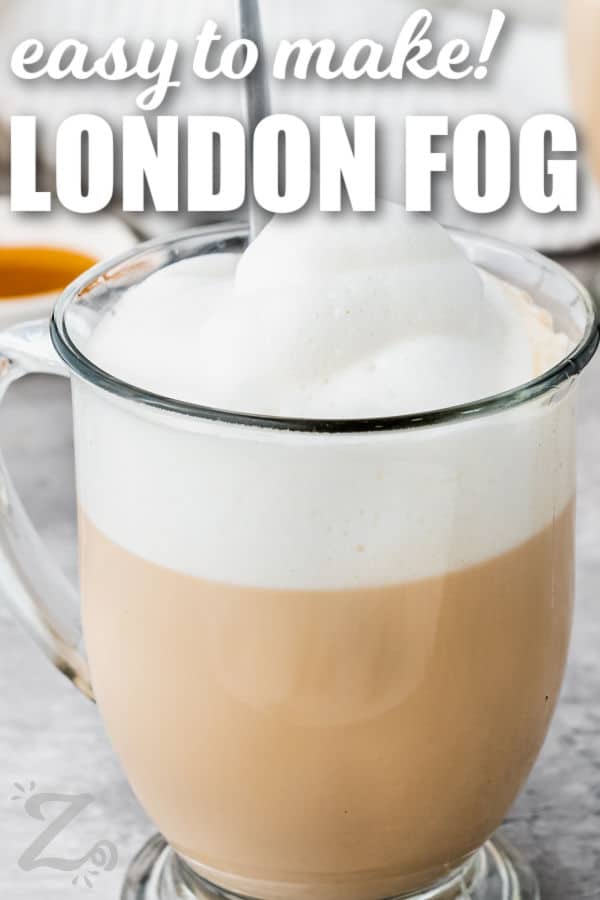 glass of London Fog with writing