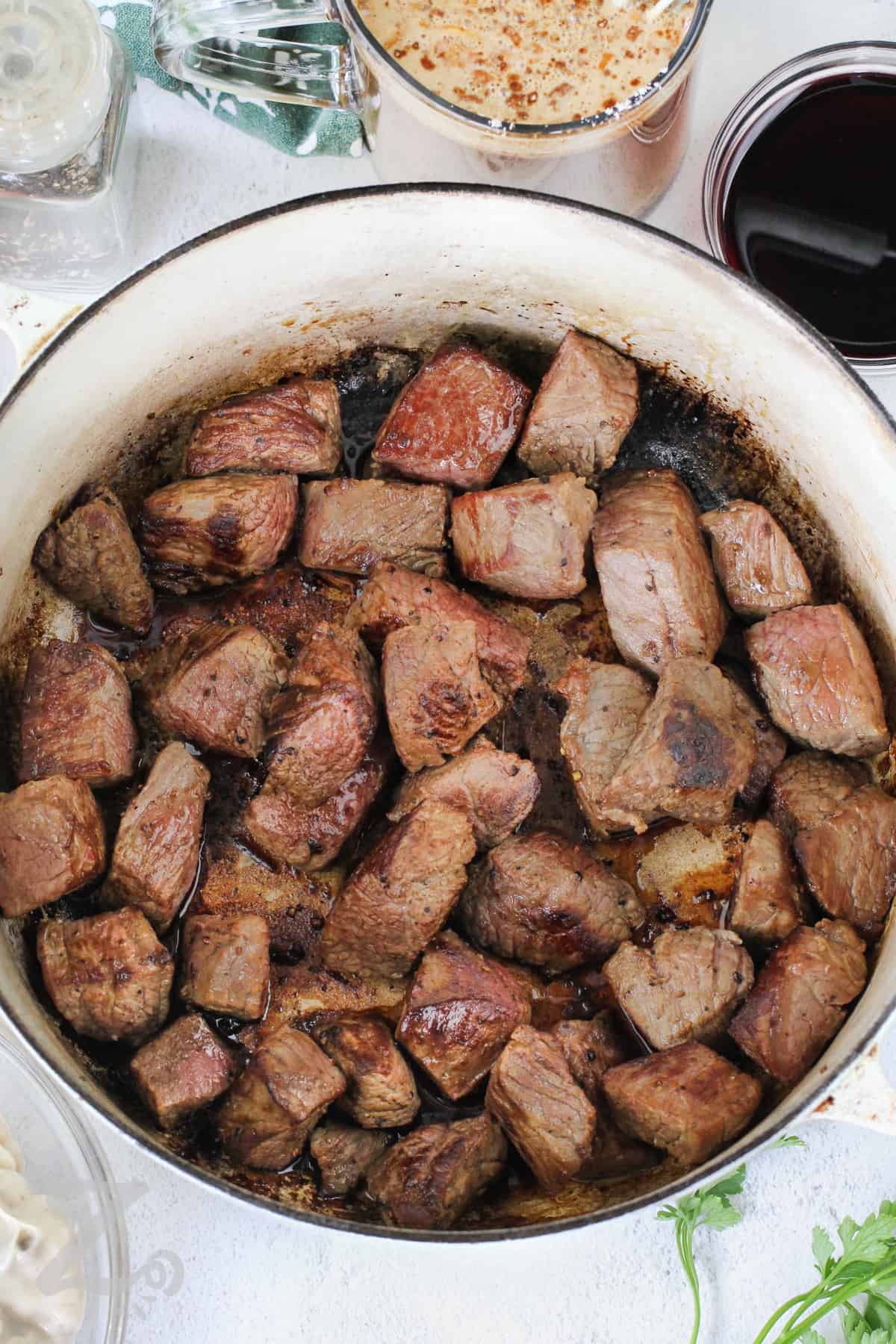 beef tips browned in a pot