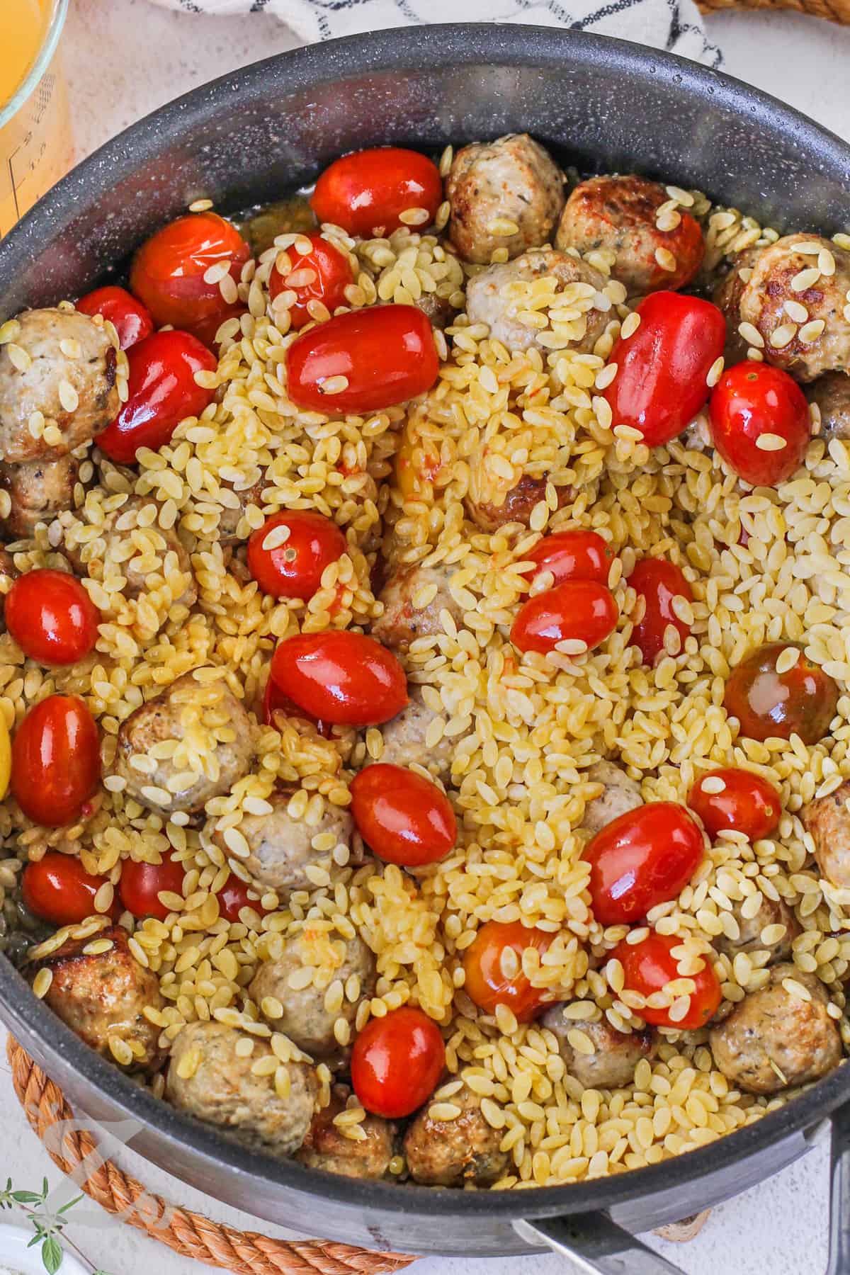 One Pot Tomato Orzo With Meatballs in the pot